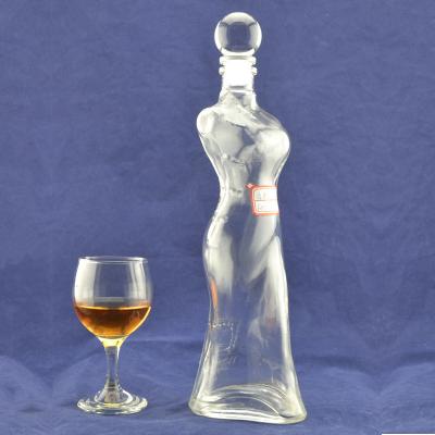 China 350 ml 500 ml 750 ml botella de vidrio en forma de cuerpo de mujer personalizada para el recipiente de alcohol espirituoso en venta