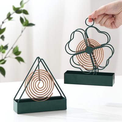 China Chinese Incense Transynergy Mosquito Coil Stretch Coil Mosquito Triangle High Quality Creative and Fashion Vertical Holder for sale