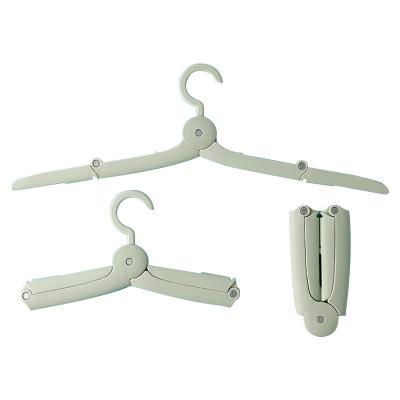 China Custom Made High Quality Plastic Magic Travel Folding Hangers Viable for sale