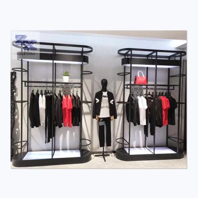 China High Quality Plated Clothing Store Fixtures Display Rack For Clothing Store Interior Decoration Design for sale