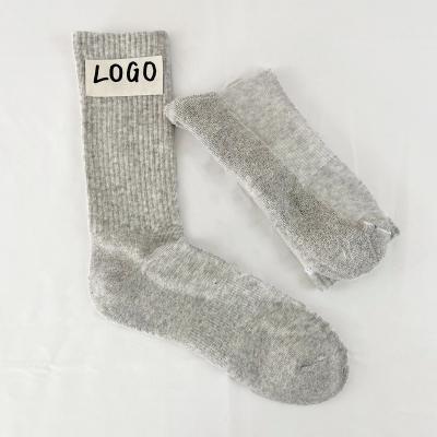 China OEM Breathable Logo Casual Sports Socks Cushioned Athletic Sports Crew Socks For Men And Women for sale