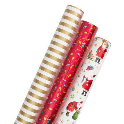 Cina Busy Santa Custom Printed Wrapping Paper Roll Gift Wrapping Paper Manufacturer Roll wrapping paper in vendita