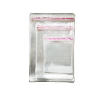 China Recyclable Clear Self Adhesive Plastic Garment Plastic Bag Opp With Seal Gift Bag 100 Pieces Clear Packaging Bag for sale