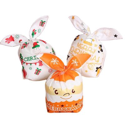 China 50pcs Christmas Disposable Rabbit Ears Packaging Plastic Bag Wedding Party Supplies Christmas New Year Cookie Candy Gift Packaging Bags for sale