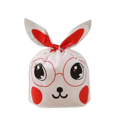 China 100pcs/bag Big Gift Snack Snowflake Pastry Plastic Bag Disposable Baked Bunny Ears Dessert Bunny Packaging Bag for sale