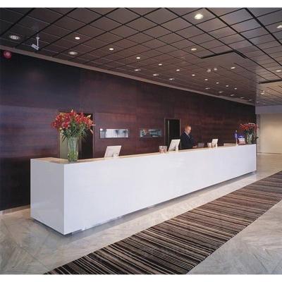 China Long Joint Seamless White Custom Front Desk Design Modern Artificial Stone Hotel Reception Counter for sale