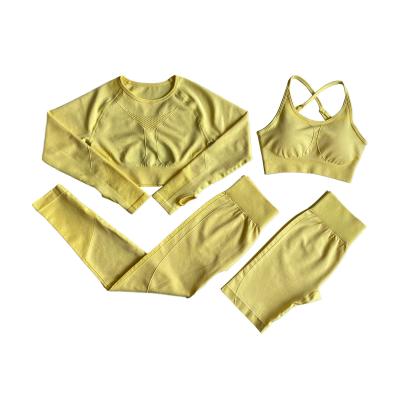 China Antibacterial Wholesale 4PCS Hollow Out Activewear Seamless Gym Equipment Workout Set For Women for sale