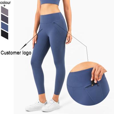 China Breathable Sportswear Women Butter Soft Workout High Waist Compression Yoga Gaiters With Zippered Pocket for sale