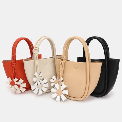 China PORTABLE Wholesale Pure Leather Ladies PU Color Bucket Bag Women Elegant Cross - Body Flower Shoulder Bags for sale