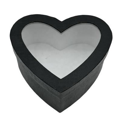 China Recyclable Black Love Cardboard Storage Paper Box Gift Heart Shaped Flower Packaging With Clear Window For Wedding Party for sale