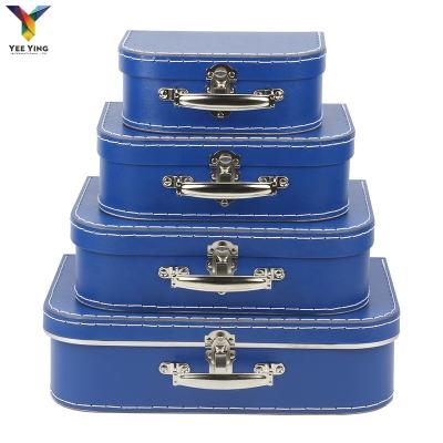 China Recycled Materials Decorate Cardboard Suitcases Toy Suitcase Box 2022 New Design Blue Box With Handle for sale