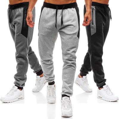 China 2022 New Sustainable Fashionable Cotton Gym Sport Tracksuit Men's 100% Custom Zipper Pouch Loose Casual Mens Jogger Panties for sale