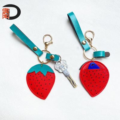 China Factory Price PU Strawberry Key Chain Shopping Coin Purse Orange Cute Orange Bulk Pouch With Metal Keychain for sale