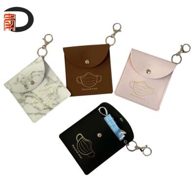 China RTS Recyclable Leather PU Face Mask Key Chain Holder, Bag Face Mask Dust Pouch Storaging Case With Personal Embossed Logo for sale