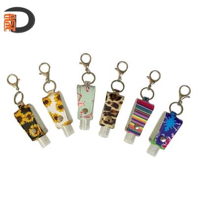 China Vietnam RTS Cartoon Printing PU Leather Blank Sanitizer Holder Hand Key Chain for sale