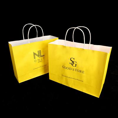 China New Recyclable Custom Size Logo Design Clothing Packing Garment Paper Bag White Paper Gift Shopping Bag for sale