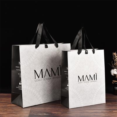 China Factory Price Recyclable Customized Paper Bag With Your Own Logo Gift Bag Kraft Paper Suitcase For Packing for sale