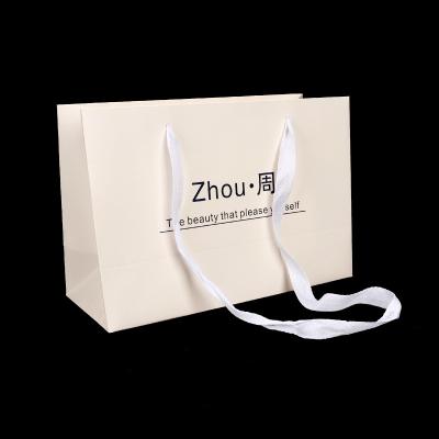 China Recyclable Custom Design Luxury Paper Bag With Handle Shopping Gift Packing Recyclable Paper Bag for sale