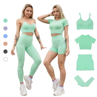 China Wholesale Breathable Women Yoga Suit Workout Wear 4 Piece Sports Bra And Pants Top Shorts Yoga Set for sale