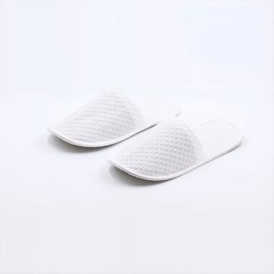 China Hotel slippers non-slip waffle customized disposable hotel slippers green hotel slippers for sale