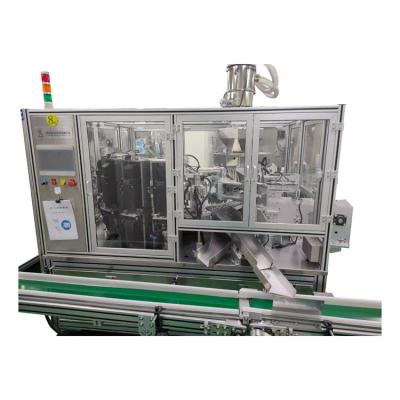 China The desiccant is automatically installed in the bin on the lid low energy consumption machine good quality desiccant filling machine for sale