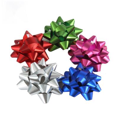 China Metal Glue Decal Gift Box Decorative PET Christmas Ribbon Star Plastic Manufacturers for sale