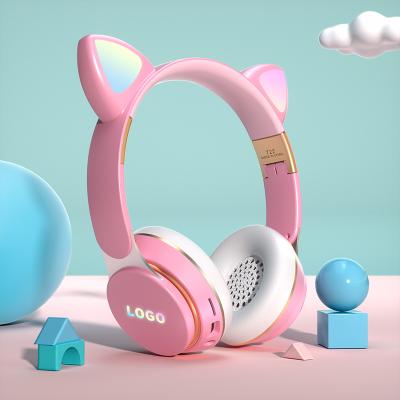 China Cute Headband T22 OEM Cartoon RGB Cat Light Ear Headphones Wire Bluetooth Kids Earbuds Wireless Stereo Headset For Kids for sale