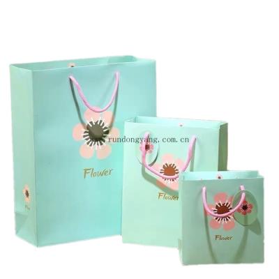 China Recyclable Custom Logo Print Shopping Paper Bag Apparel Shoe Packaging Cheap Washable Gift Paper Bags for sale