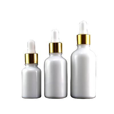 China High Qiality Hot Sale Ceramic White Glass Tincture Toner 15ml 30ml 50ml Oil Essence Oil Dropper Bottle Glossy White Glass Vial With Pipette for sale