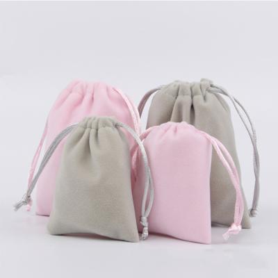 China Easy carry and shear soft fleece materical wool and nylon string cotton double string Mini Personalized Drawstring Small Bag for kids for sale