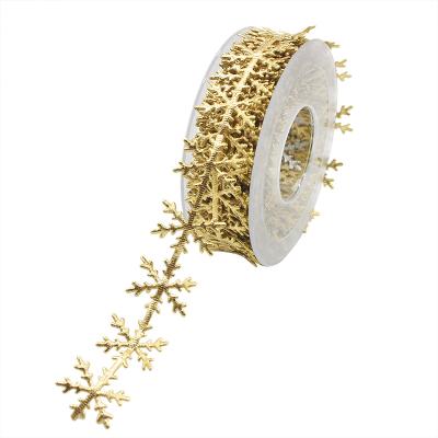 China New Artificial Leather Floral Gold and Silver Snowflake Ribbon Lace Christmas Ribbon Bun Decoration Materials for sale