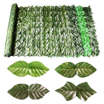 China Easy To Install China Manufacturers Faux Plastic Plants Fence Home Decoration Artificial Green Leaf Fence For Garden for sale