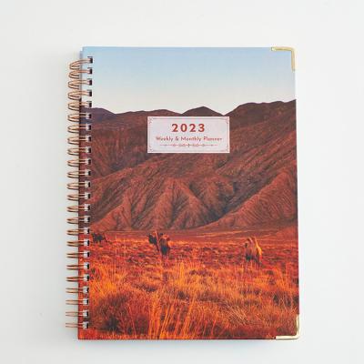 China Spiral Wholesale Custom Printing Personalized A4 A5 Hardcover Spiral 2023 Yearly Weekly Daily Planners Organizer and Journal Notebooks for sale