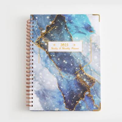 China Spiral Wholesale custom printing hardcover A5 Spiral budget planner 2023 daily agenda monthly planner notebook with stickers for sale