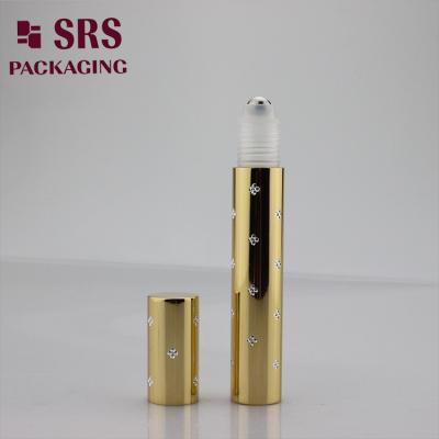 China SRS empty cosmetic gold color 15ml perfume aluminum roll on bottle à venda