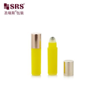 China RPA(S)-2ML Shiny Bright Yellow Round Perfume Roller Bottle With Rose Gold Cap for sale