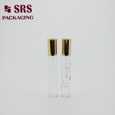 China SRS empty 8ml clear glass perfume roll on bottle with gold aluminum cap à venda