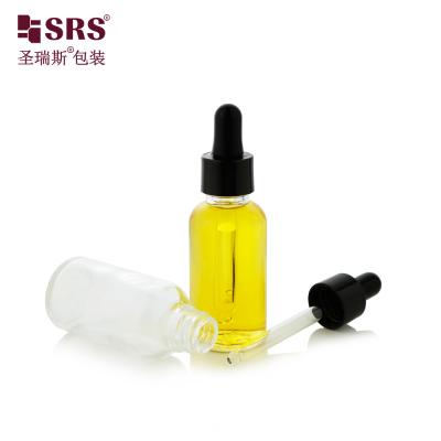 China D001 Clear Essential Oil Bottle With Dropper Glass Thick Wall Bottle For Facial Serum Essence for sale