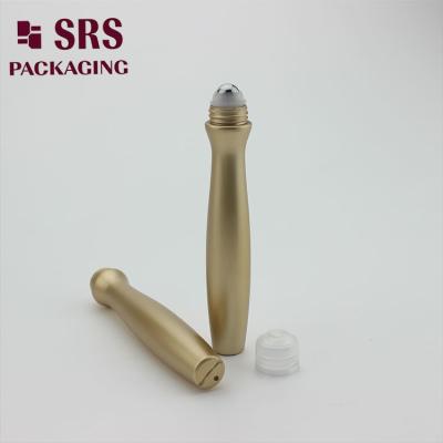 China SRS packaging empty plastic eye cream gold color 15ml roll on bottle à venda