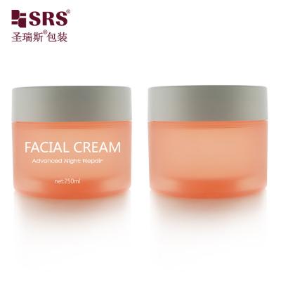 China SRSJK-250g Round Cylindrical Shape Food Grade Empty Frosted Orange Translucent Plastic Jar With Double Layer Design White Lid Closure For Eye Pads à venda