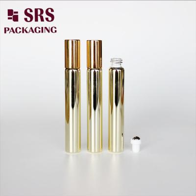 China SRS cosmetic empty 10ml gold glass roller ball perfume bottle à venda