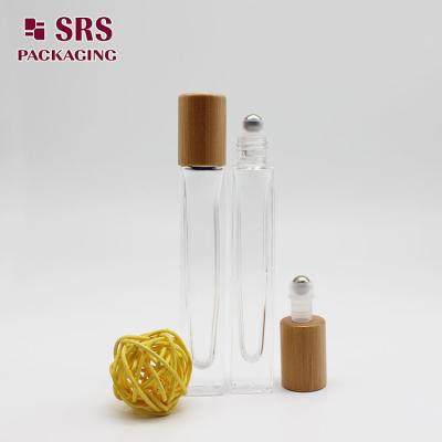 China SRS cosmetic clear 10ml perfume square glass roller bottle with bamboo cap for sale