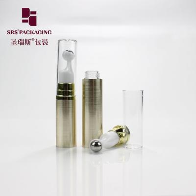 China Empty plastic cosmetic gold color 5ml 10ml 12ml 15ml mini eye cream roller bottle for sale