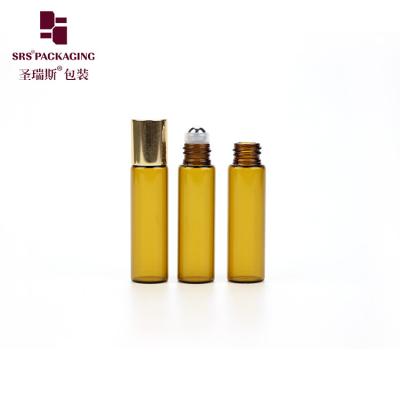 China Empty Cosmetic Amber Color Mini 5ml Glass Roll On Bottle With Aluminum Cap à venda