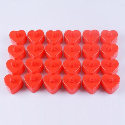 China Romantic Flameless Igniting Led Flameless Heart Shaped Candle Tea Lights Electric Flickering Outdoor Candles for sale