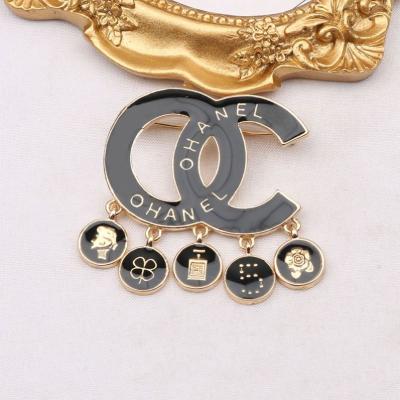 China Classic Drip Pin Fashion Brand Designer Oil CC Style Oil Drip Classic Tassel Clothing Dangle Brooch Pin for sale