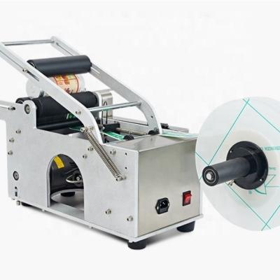 China High Quality Semi Automatic Manual Adhesive Sticker Applicator Food Round Bottle Labeling Machine For Pocket for sale