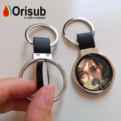 China Blank For Sublimation Dubai Rotary Sublimation Key Chain With Double Sides Printing for sale