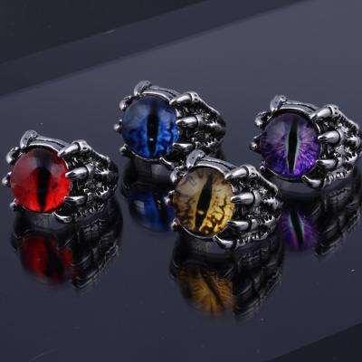 China Retro Wolf Claw Personality Punk Men's Demon's Eye Inlaid Ring for sale