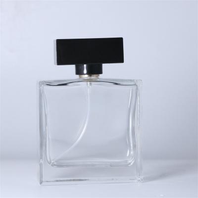 China Personal Care In Glass Stock 100ml Square Spray Perfume Transparent Bottle And Cap With Box for sale